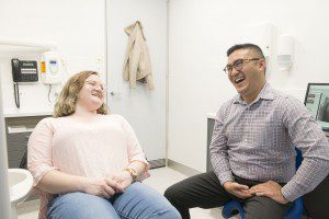 Dr jasper lee, associate dentist having a laugh with a patient